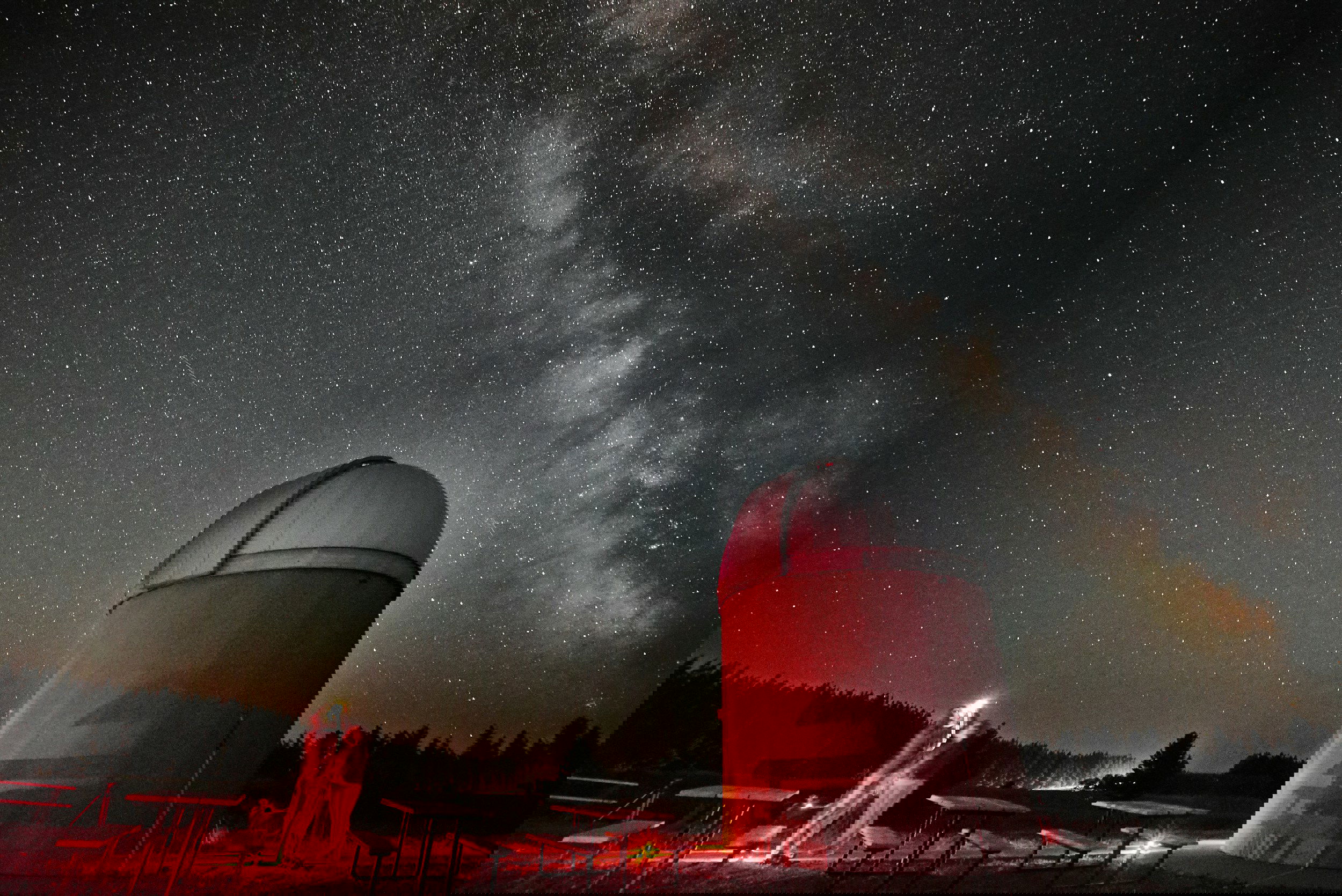 A vibrant illustration of a powerful telescope observing distant galaxies, exoplanets, and Earth’s ecosystems, symbolizing the cosmic insights of telescope science.