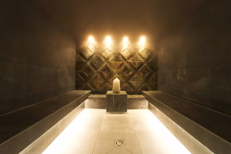 A calm massage room inside a wellness spa