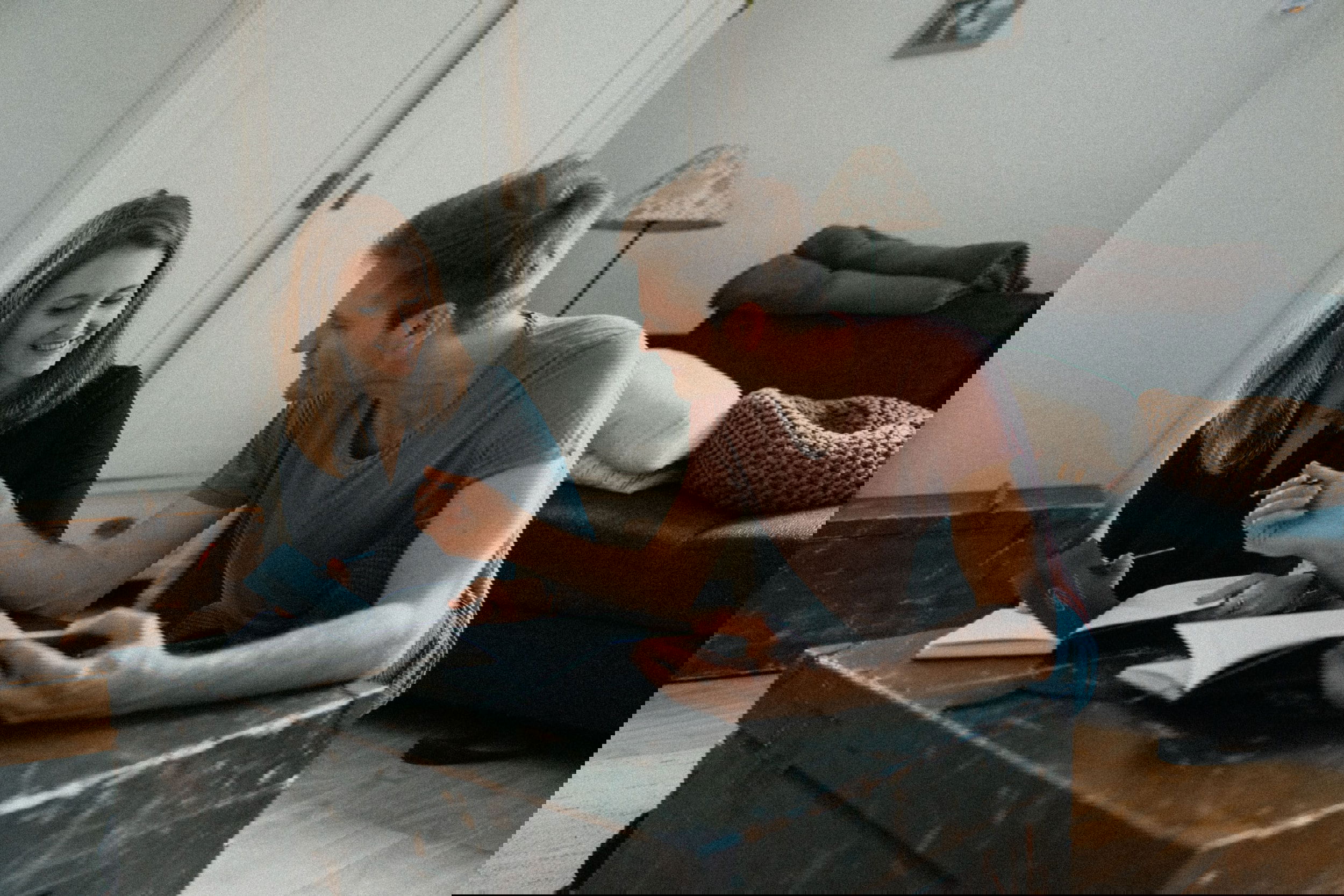 calm living room with a couple reviewing documents together