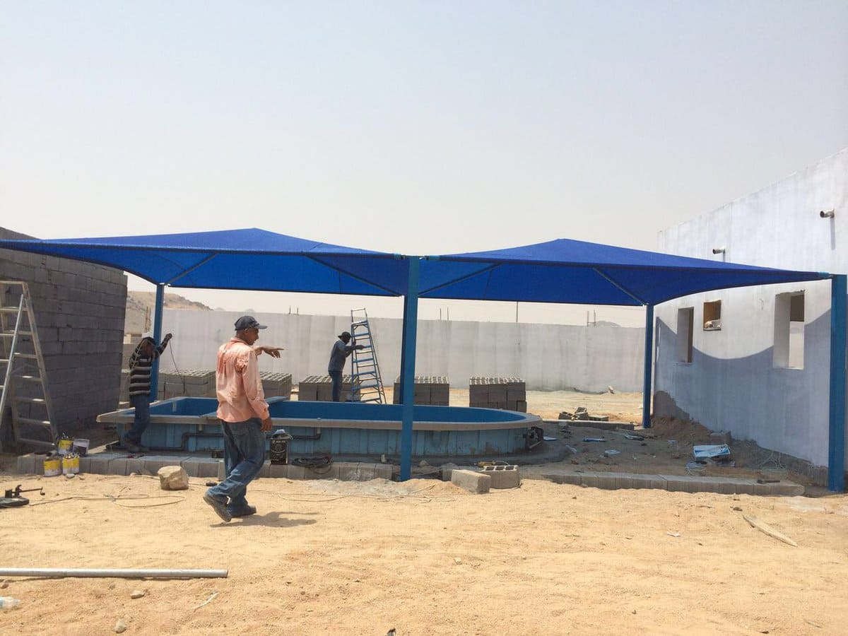 Swimming pool umbrellas (pictures below)