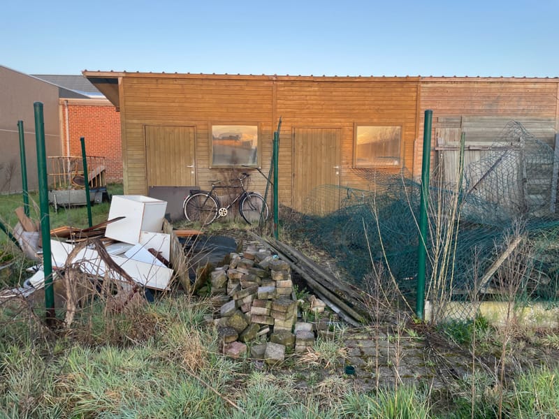 Opruiming tuin te Zwevezele.