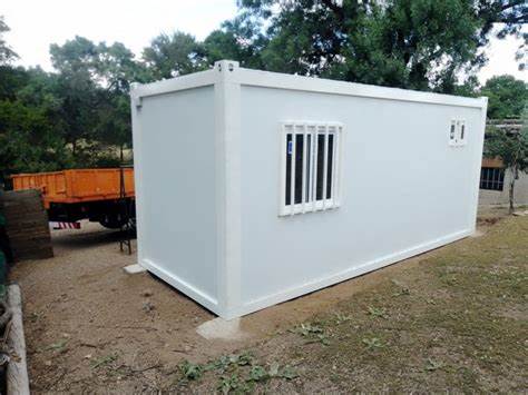 Casa Prefabricada con Panel Sándwich