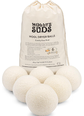 6 white wool balls with a Molly's suds carrying case