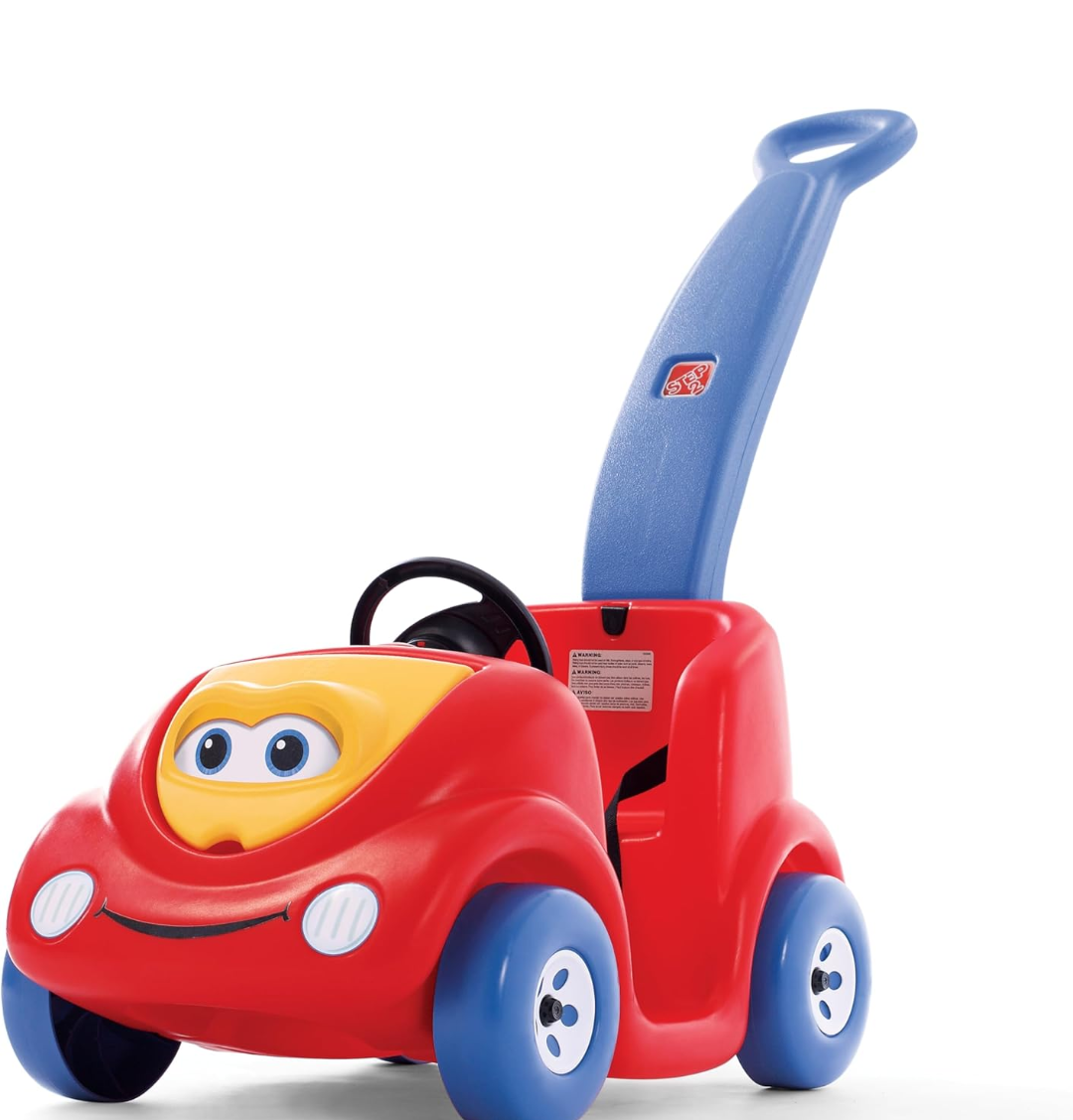 A red push buggy for children