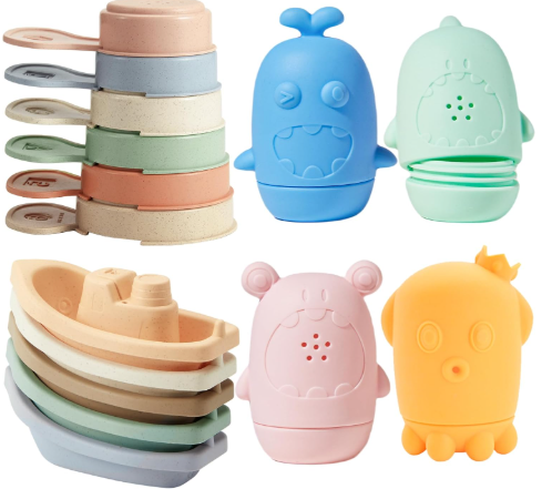 Stacked scoop toys, boats and squirting bath toys.