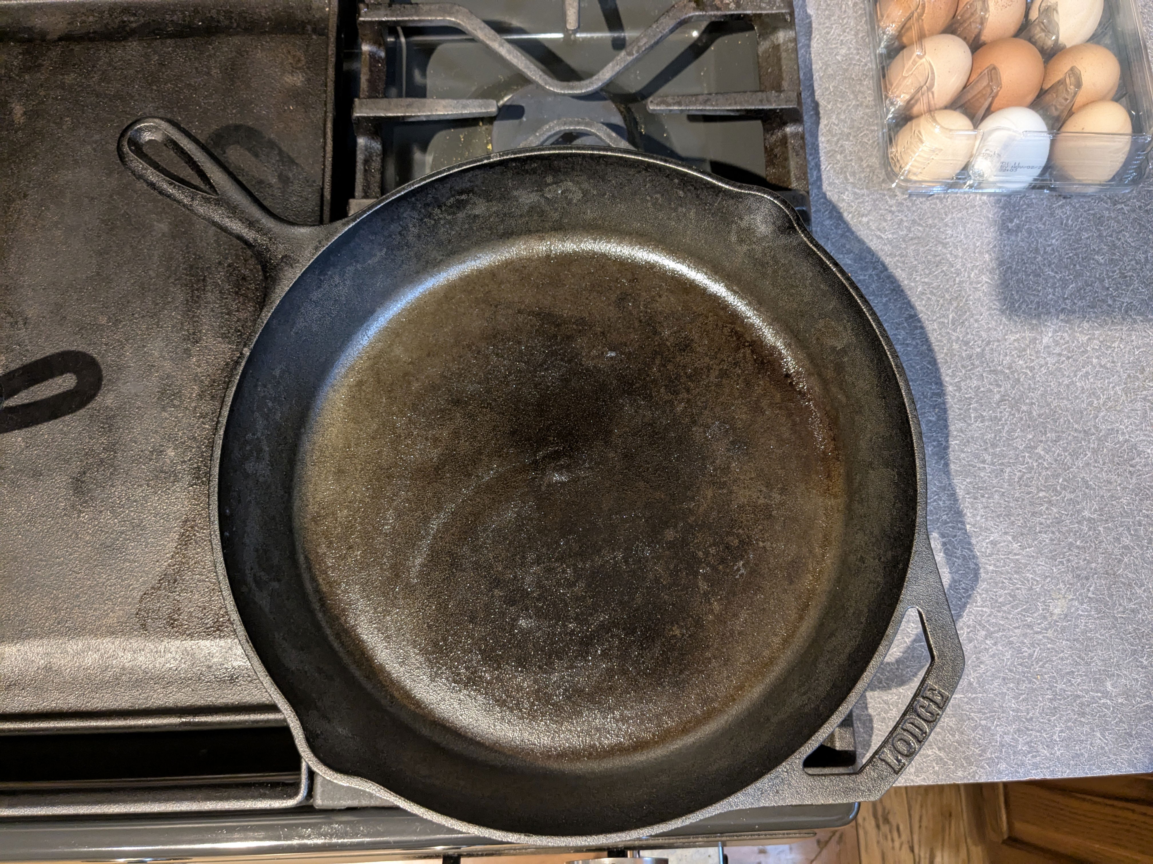 A 12 in cast iron pan on a cast iron stove