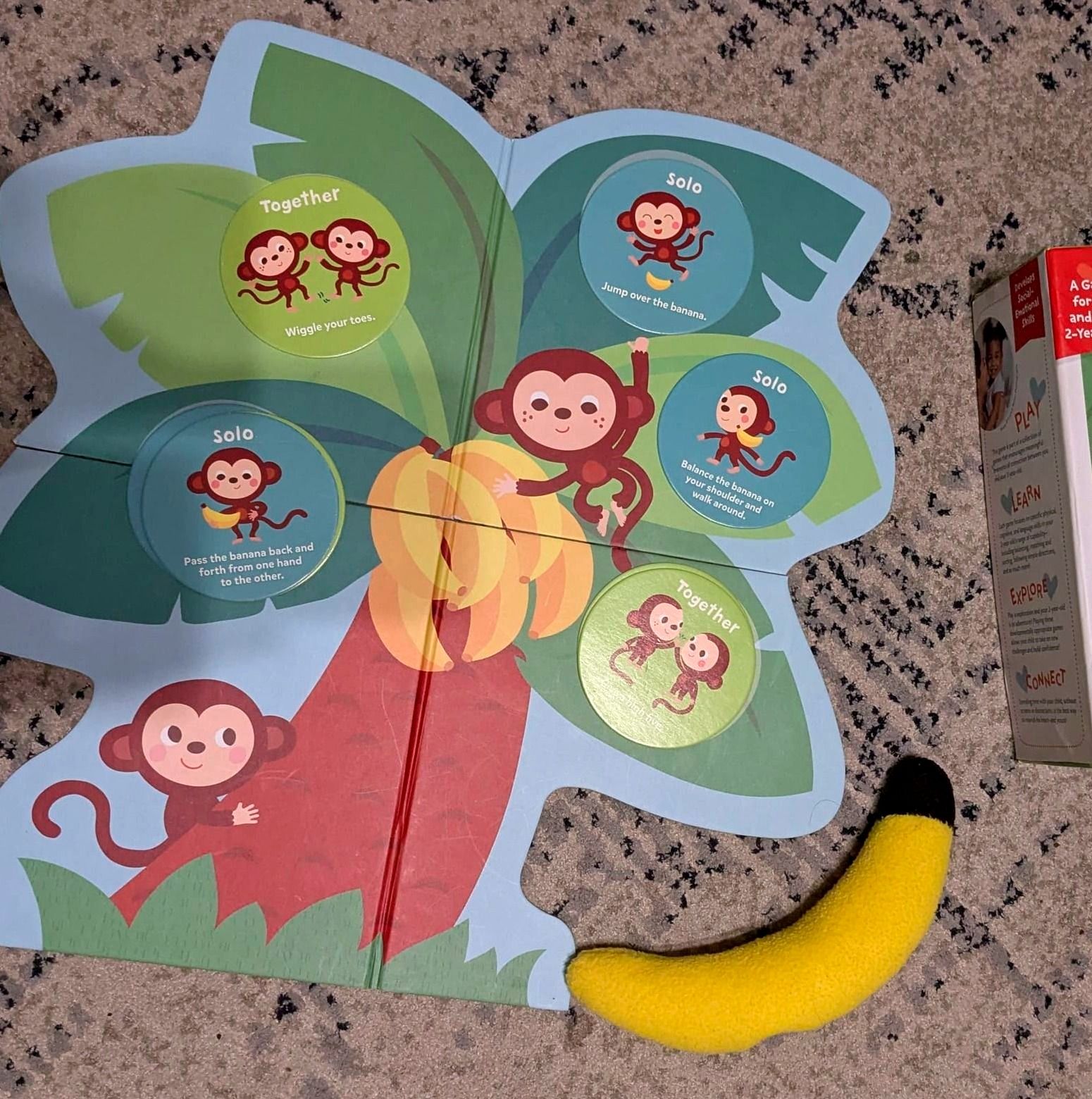 monkey Round board game featuring a tree and special playing cards with a beanie banana