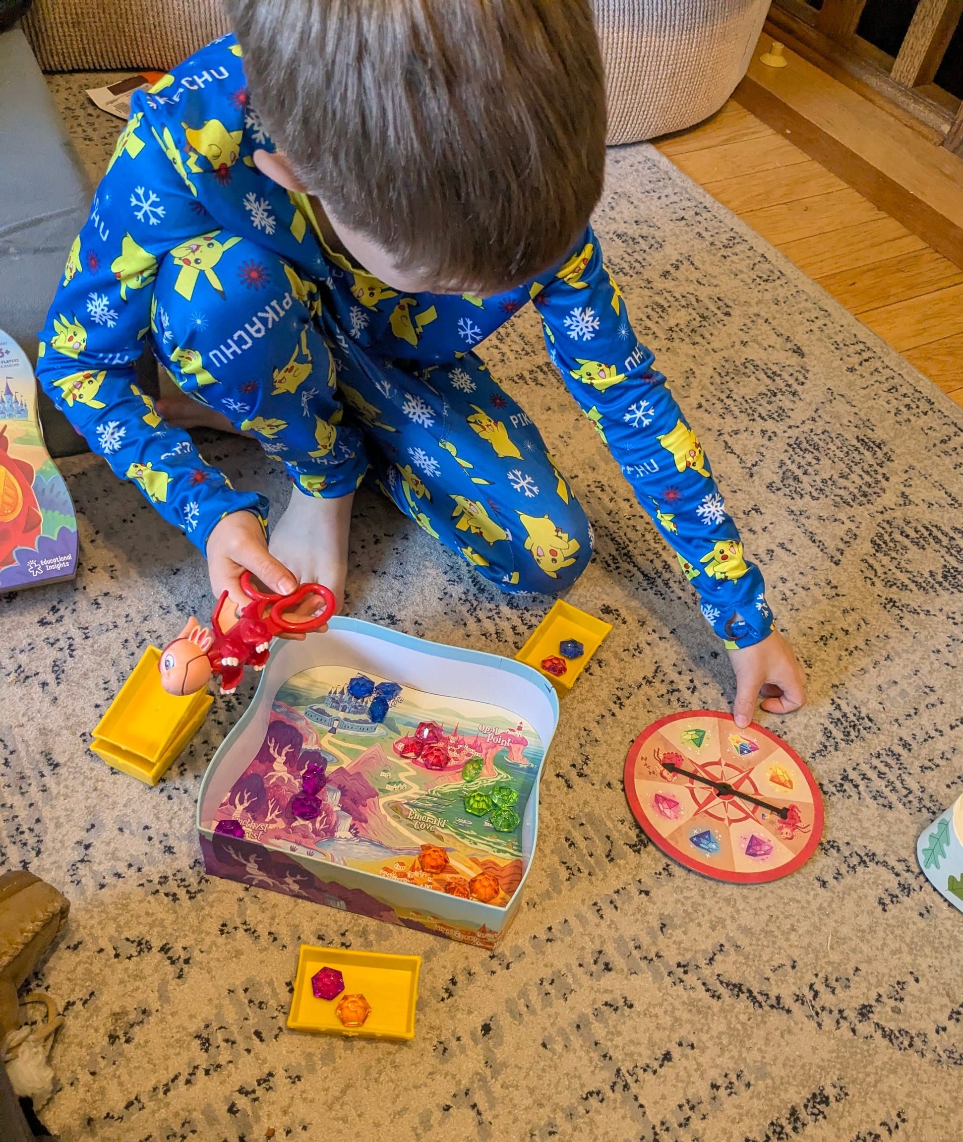 A young boy playing Ruby's Gem Quest