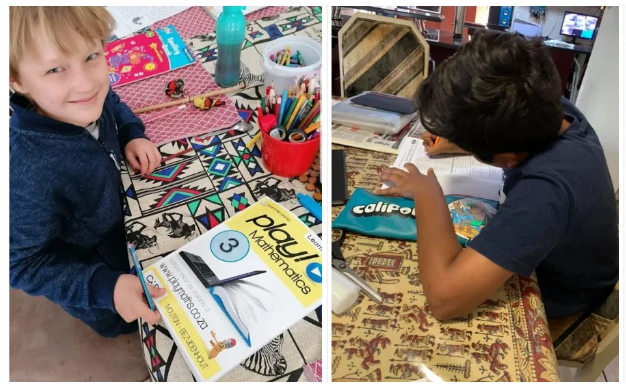 Kids using Play Maths books