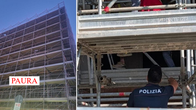 Si arrampica su un ponteggio edile alto circa 15-20 metri..