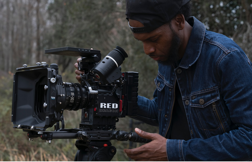 A documentary crewing film in a local town