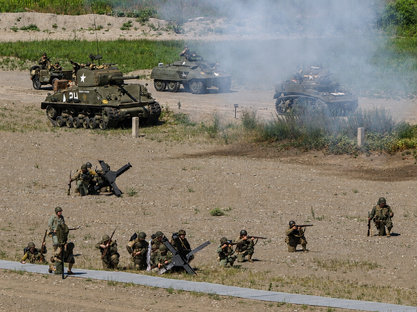 US troops advance on Normandy Beach, D-Day Ohio WW2 reenactment, August 14, 2025 [Photo: S Cobaugh]