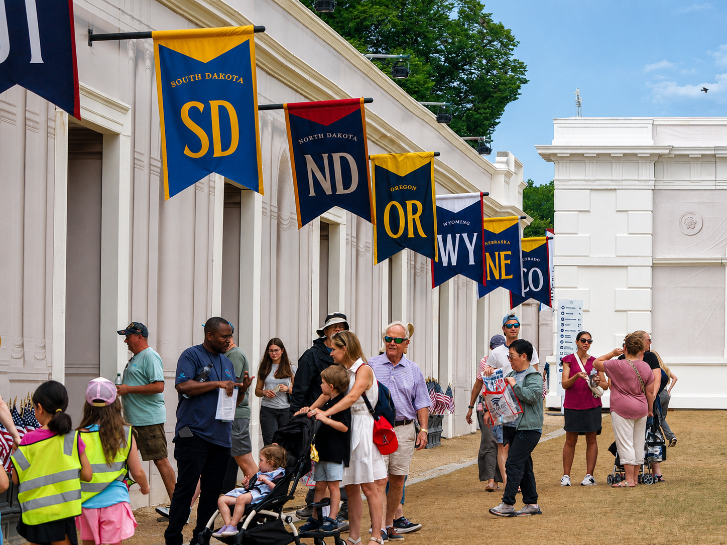 Freedom 250 event: Visitors walk by some of the booths representing the country's 56 states and territories, The Great American State Fair, National Mall, Washington, DC, July 8, 2026