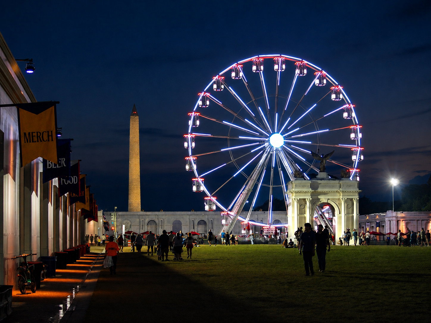 Freedom 250 event: A 110-foot-tall Ferris Wheel at night, with a scale replica of a proposed America 250 commemorative arch, is viewed looking west towards the Washington Monument at the Great American State Fair which ran June 25-July 10, 2026, The Great American State Fair, National Mall, Washington, DC, July 8, 2026 [Photo: S Cobaugh]