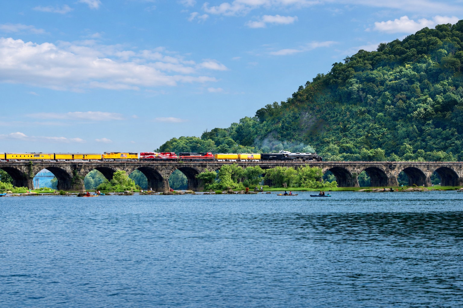 America 250 event: Union Pacific Big Boy No. 4014 heads westward across the Susquehanna River above Harrisburg, PA, as part of a nationwide tour, July 7, 2026 [Photo: Dana Dymond]