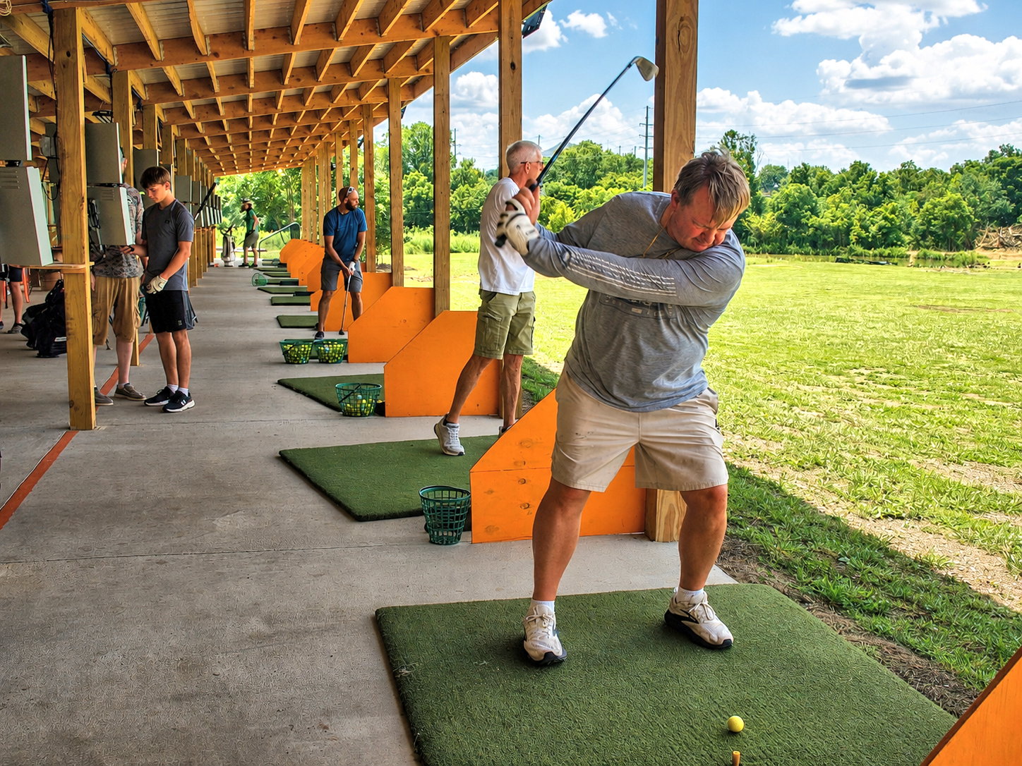 Kingsport Fun Fest: A golfer takes a swing at Rocky Top Golf, a free 9-hole golf tournament, Kingsport, TN, July 20, 2026 [Photo: S Cobaugh]