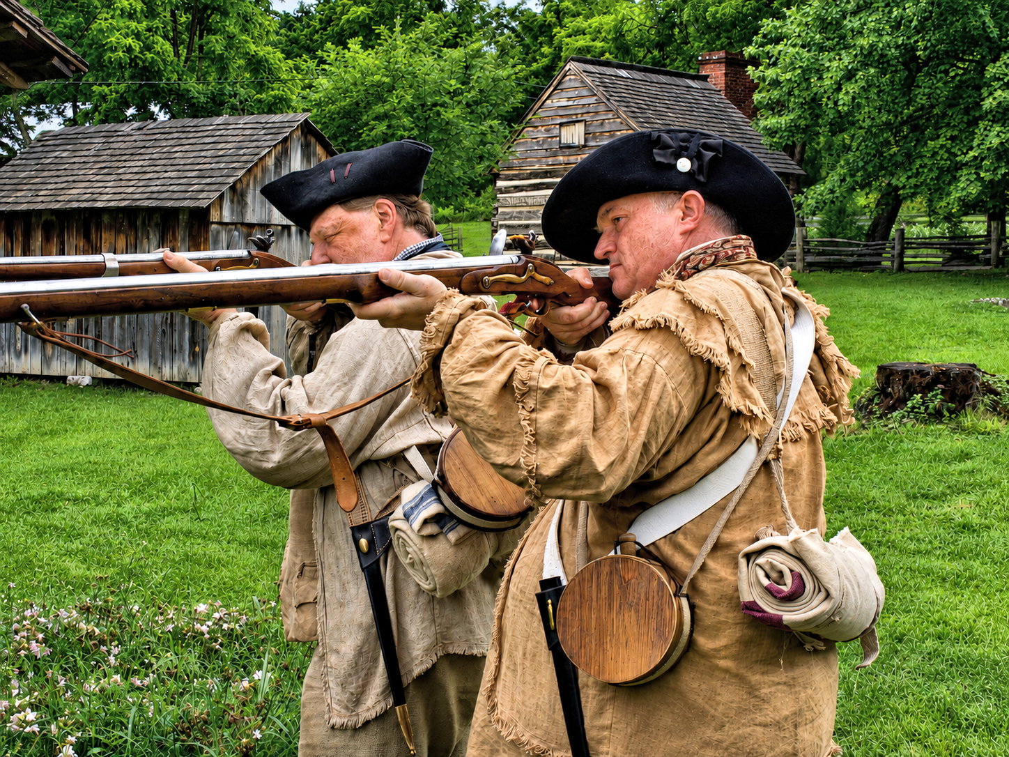 Kingsport Fun Fest: Two Revolutionary War patriot reenactors take aim during the 250th anniversary of the Battle of Island Flats, Exchange Place Living History Farm, Kingsport, TN, July 25, 2026 [Photo: S Cobaugh]