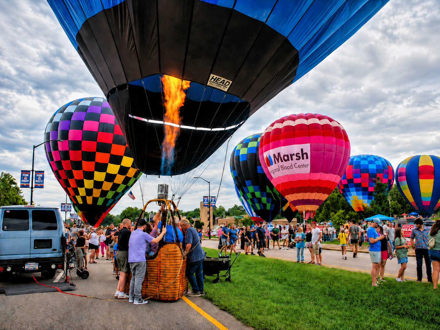 Kingsport Fun Fest: a propane burner is ignited to keep a hot air balloon inflated on Fort Henry Drive, Kingsport, TN, July 25, 2026 [Photo: J Lowry]