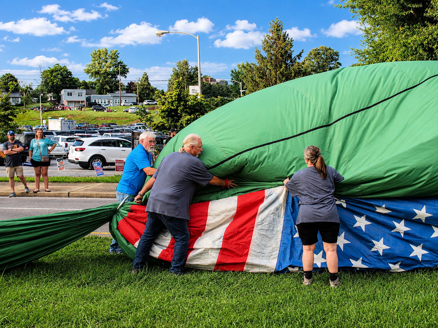 Kingsport Fun Fest: A pilot and his crew deflate a hot air balloon during the Hot Air Balloon Rally, Kingsport, TN, July 25, 2026 [Photo: S Cobaugh]