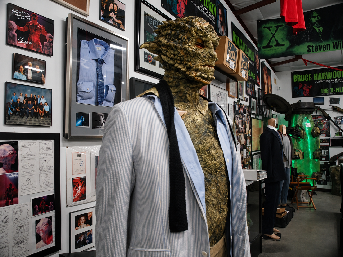 A creature costume and other production memorabilia are displayed at The X-Files Preservation Collection & Collectibles in Saratoga Springs, N.Y. The museum preserves thousands of pieces associated with “The X-Files” and restores some props and wardrobe items when necessary before placing them on permanent display. [Photo: D Dymond, Aug. 20, 2026]
