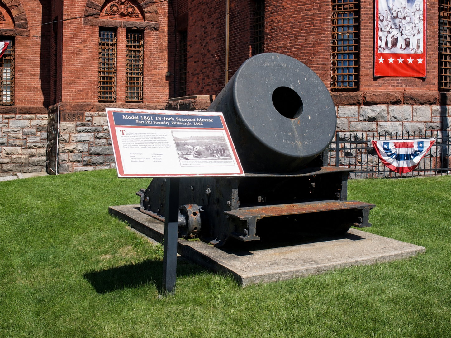 A Model 1861 13-inch seacoast mortar, cast at the Fort Pitt Foundry in Pittsburgh in 1863, is displayed outside the New York State Military Museum and Veterans Research Center in Saratoga Springs, N.Y. The massive Civil War weapon reflects the museum’s particularly strong holdings from the conflict, which form one of the most extensive portions of its collection. [Photo: S Cobaugh, Aug. 21, 2026]