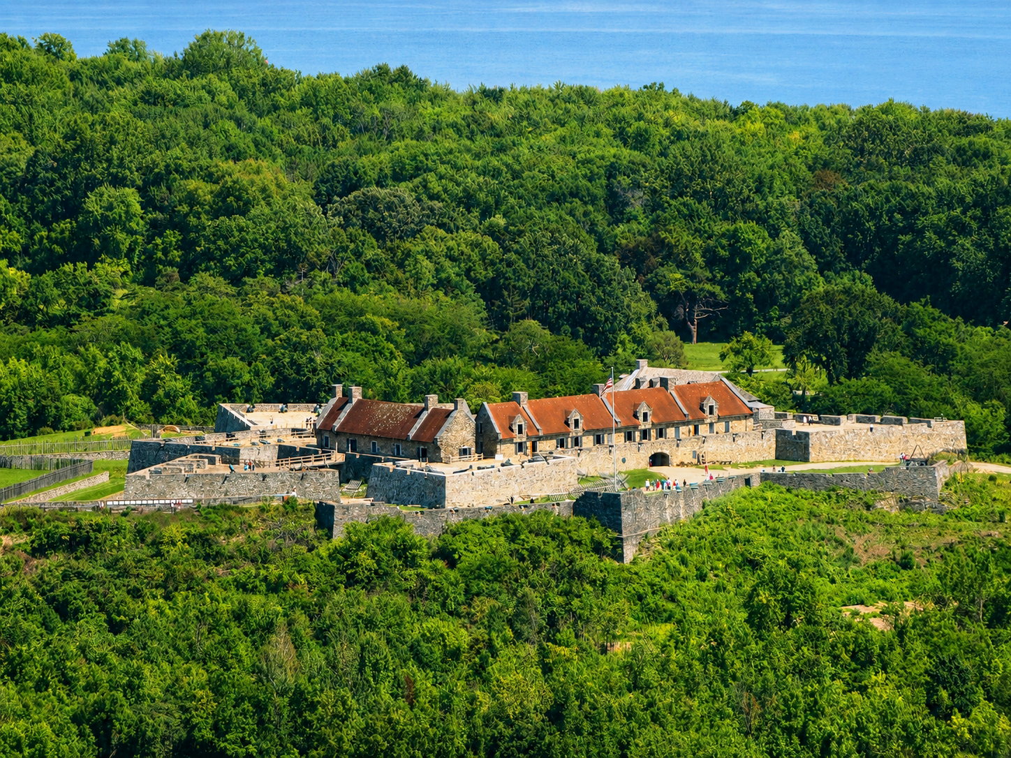 America 250: Fort Ticonderoga stands above Lake Champlain in Ticonderoga, N.Y., as seen from Mount Defiance. Built by the French in 1755, it played a pivotal role in the American Revolution as it was seized by patriots from the British garrison in 1775. [Photo: S Cobaugh, Aug. 22, 2026]
