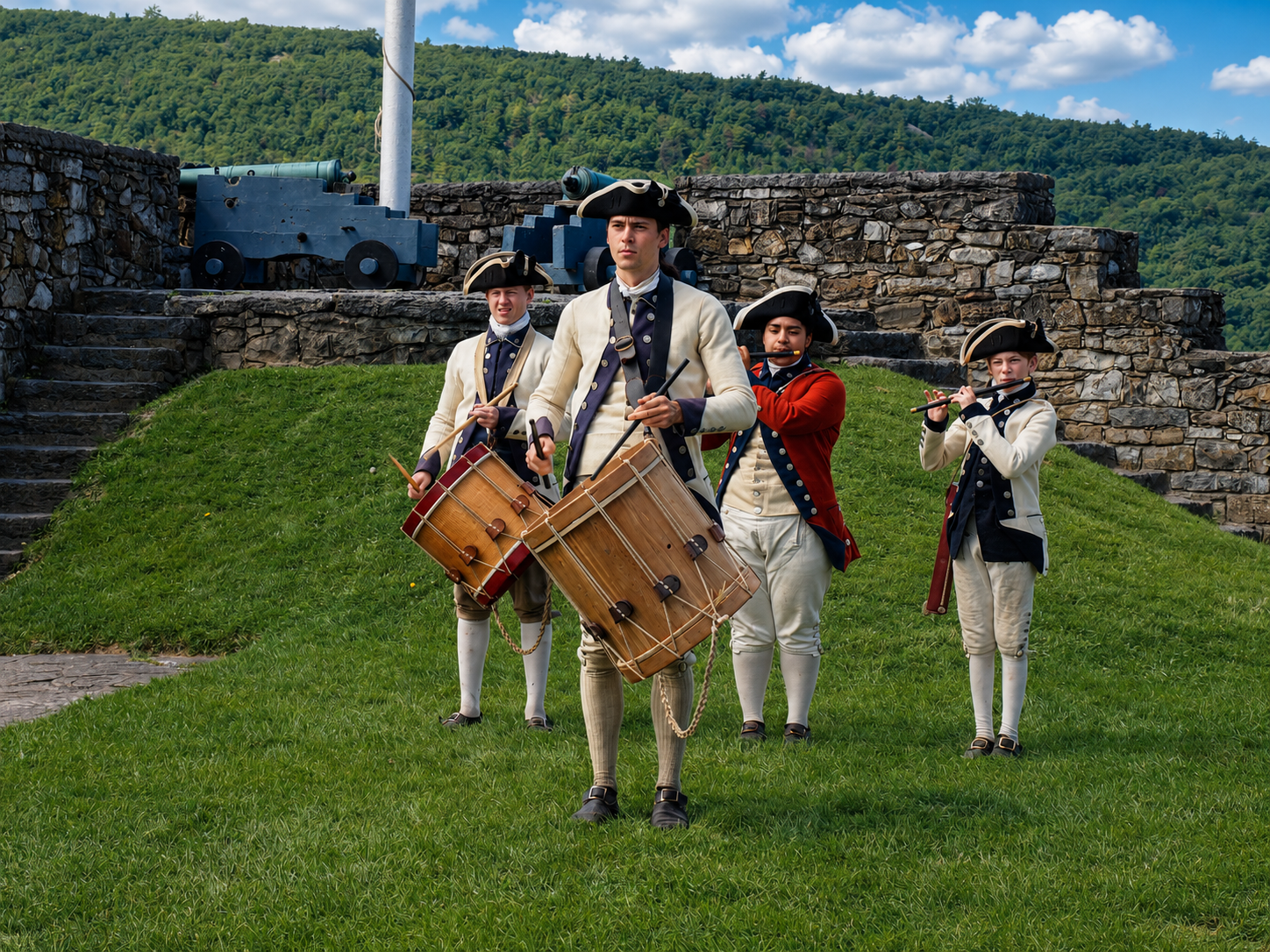 America 250: Fort Ticonderoga interpreters perform with fifes and drums during a living-history program in Ticonderoga, N.Y. Military music was more than entertainment in the 18th century, with drumbeats and fife tunes used to regulate daily activity and accompany soldiers on the march. [Photo: S Cobaugh, Aug. 22, 2026]