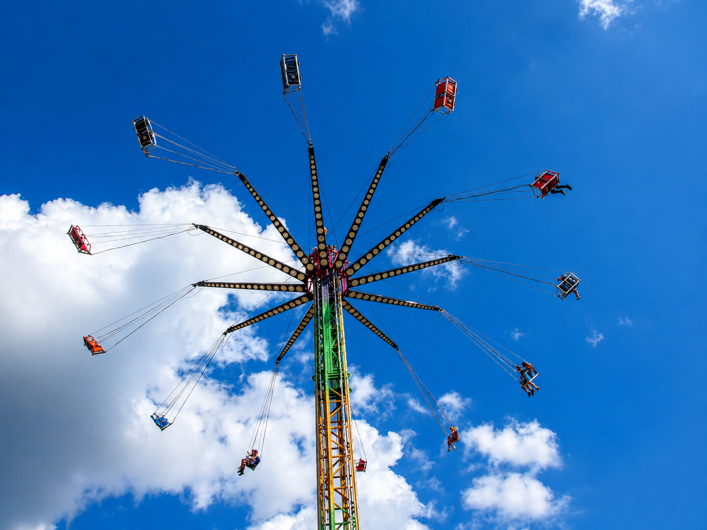 Visitors to the Appalachian Fair in Gray, Tenn., ride the tower swing ride. It is a high-altitude version of the traditional chair-swing carousel. [Photo: S Cobaugh, Aug. 27, 2026]