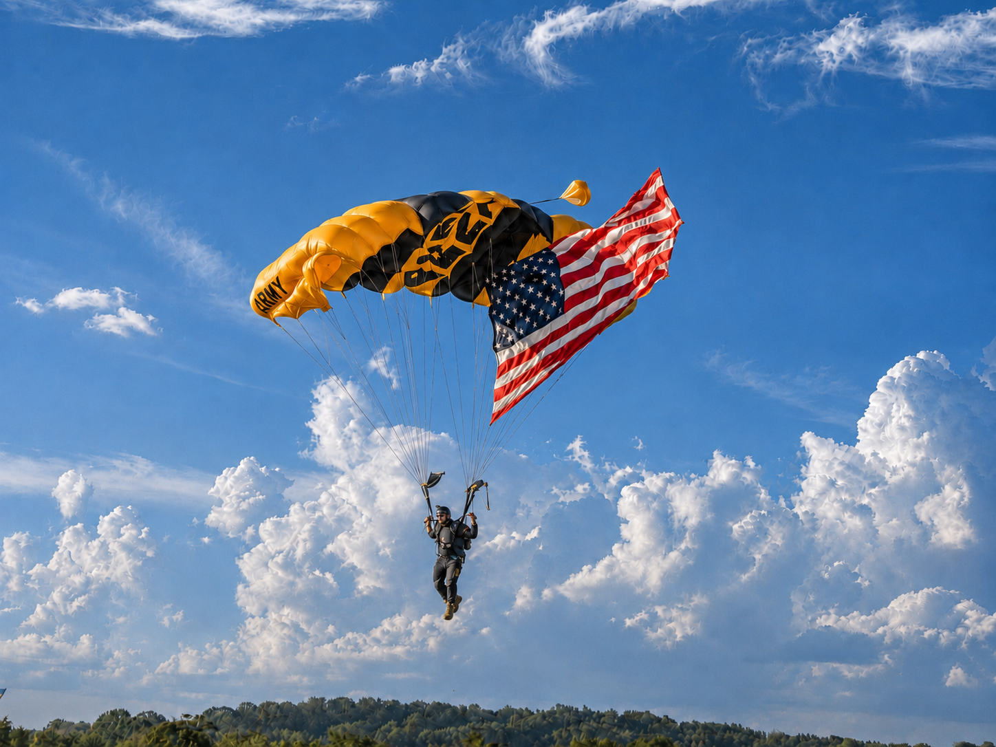 A U.S. Army Golden Knights parachutist carries a large American flag while descending over the Appalachian Fairgrounds during the 100th Appalachian Fair in Gray, Tennessee. The Golden Knights, the Army’s precision parachute demonstration team, were featured as part of the fair’s centennial celebration in August 2026. [Photo: J Lowry, Aug. 27, 2026]
