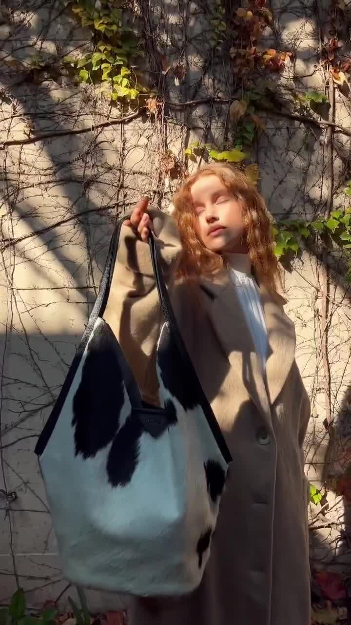 Azienda Prüne - specializzata nella produzione e vendita di borse, calzature, e accessori.