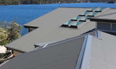 Deciding Between Roofing Restoration and Complete Roof Replacement