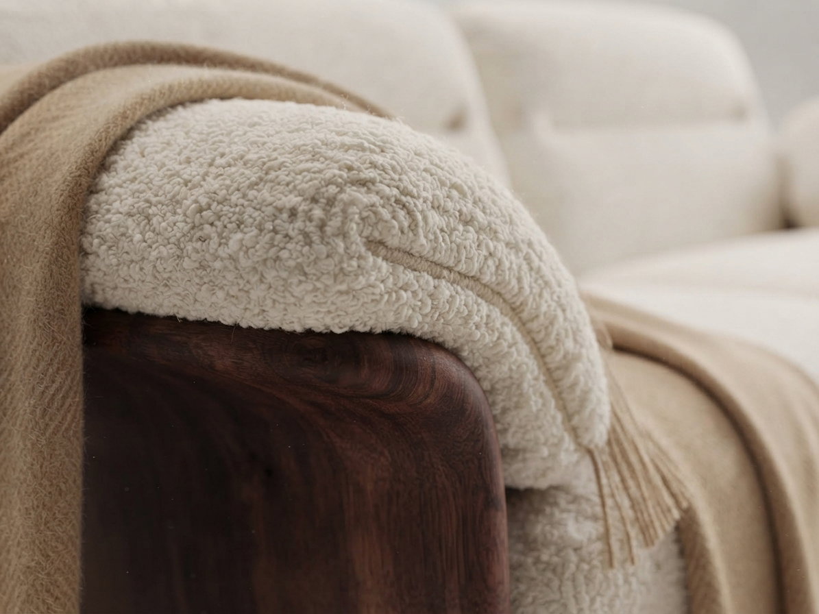 Close-up of custom restaurant sofa upholstery, dark wood frame and detailed craftsmanship