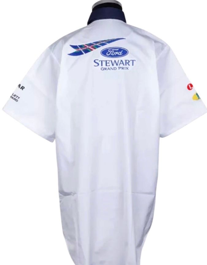 SIR JACKIE STEWART SIGNED STEWART GRAND PRIX F1 TEAM PIT CREW SHIRT 1988