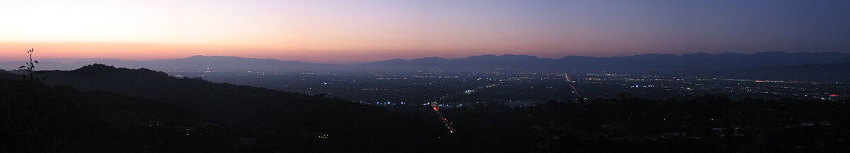 Photograph of San Fernando Valley at sunset from Mulholland Drive.