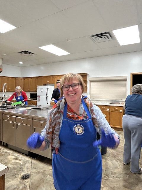 Many hands make light work! CWL ladies preparing lunch