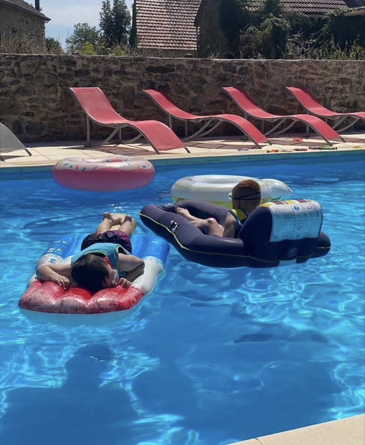 Pool and Sunbathing Area