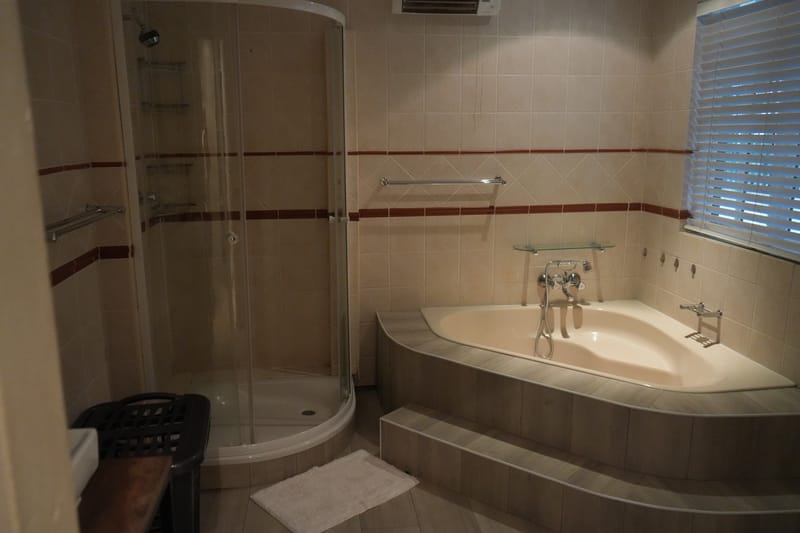 Master Bedroom with en-suite bathroom and walk-in cupboard