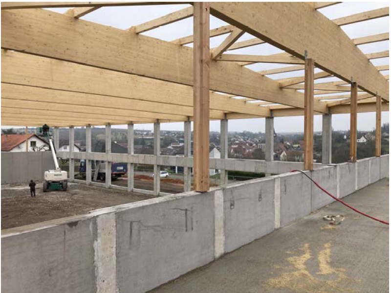 Charpente en bois - Couverture en bac acier isolé - Bardage métallique