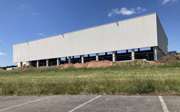 Charpente en bois - Couverture en bac acier isolé - Bardage métallique