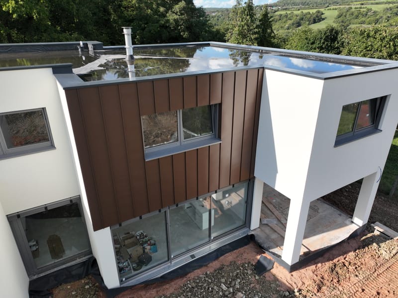 Etanchéité EPDM avec isolation - Bardage en aluminium pose en joint debout