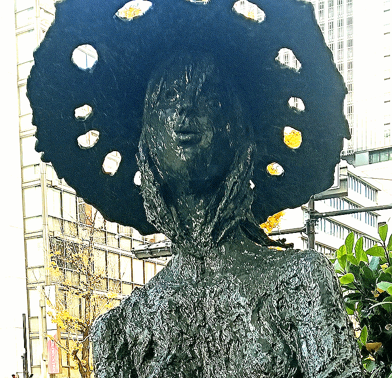 都市生活における沈黙と現実主義 ― 淀井敏夫