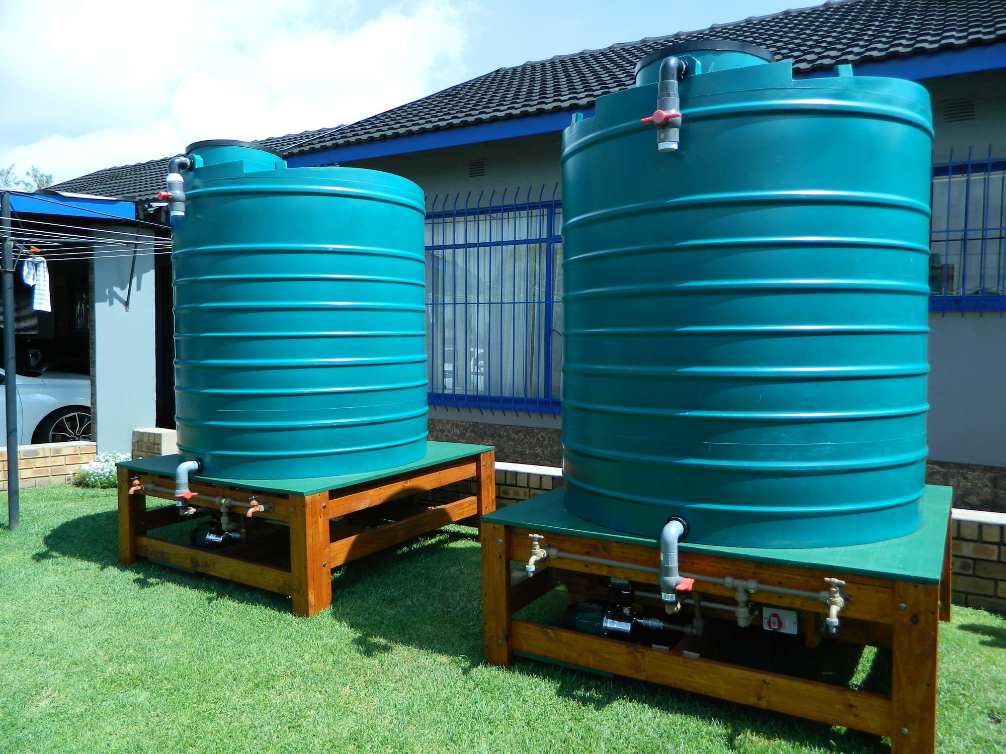 Tank on a Stand with Fittings and Pump