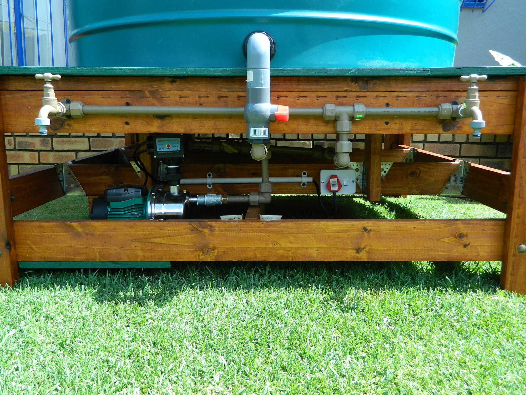 Tank on a Stand with Fittings and Pump