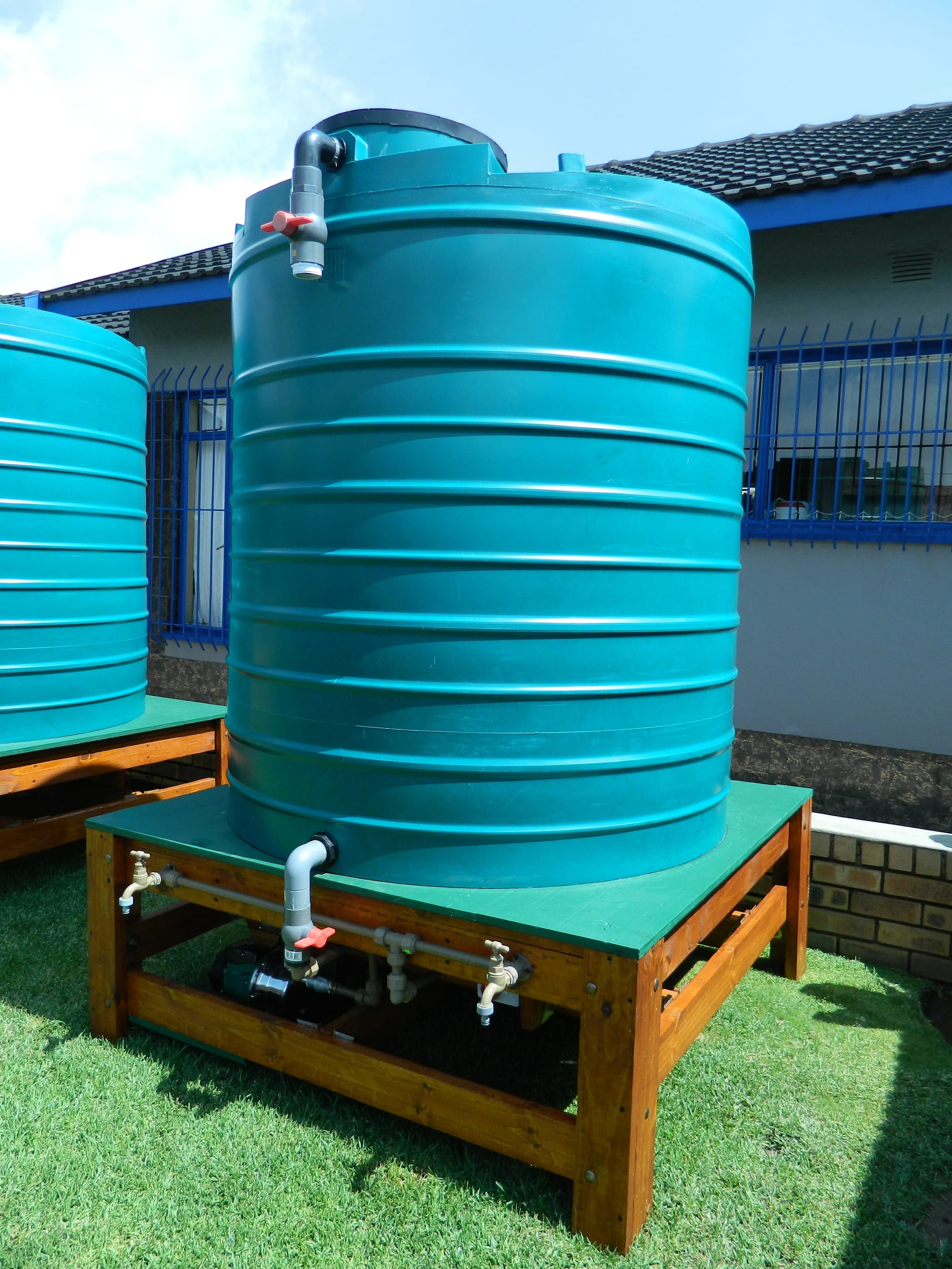 Tank on a Stand with Fittings and Pump
