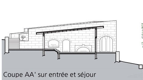 Façade en bardage bois et pierre de taille