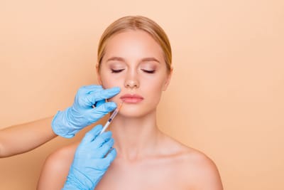 Why do people choose lip fillers for symmetry?