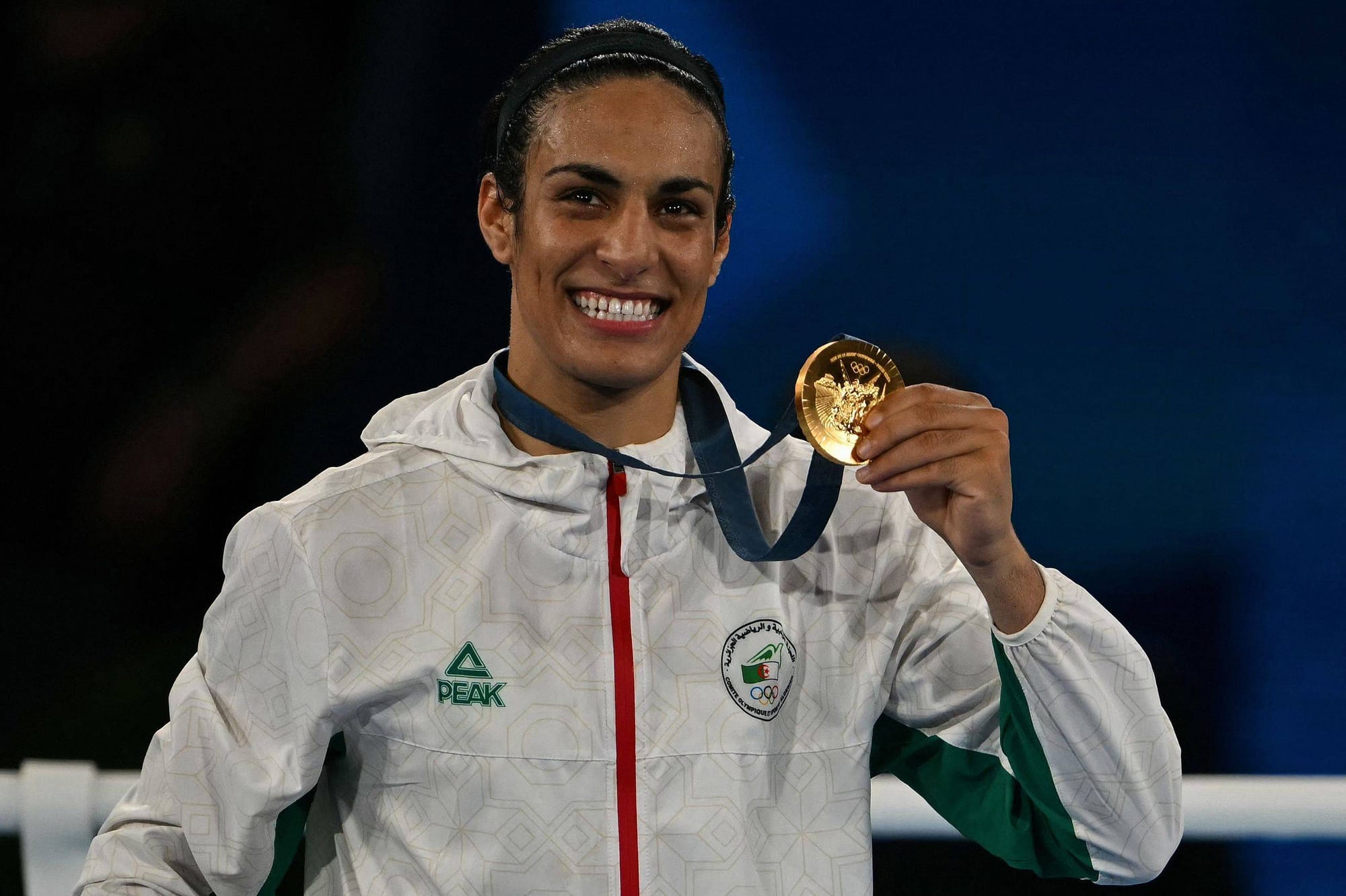 Iman Khalif gives Algeria its first gold medal in women's boxing at the Olympic Games