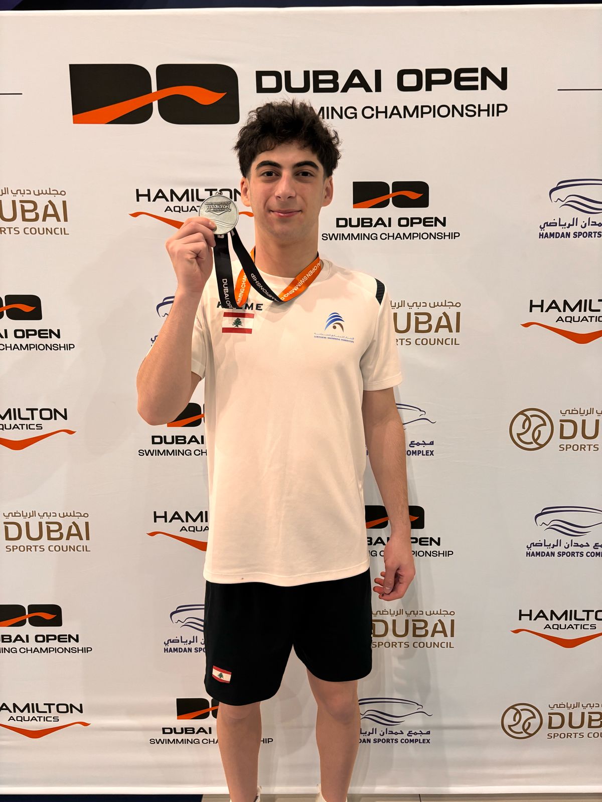 أرقدان يتألق في بطولة دبي المفتوحة للسباحة