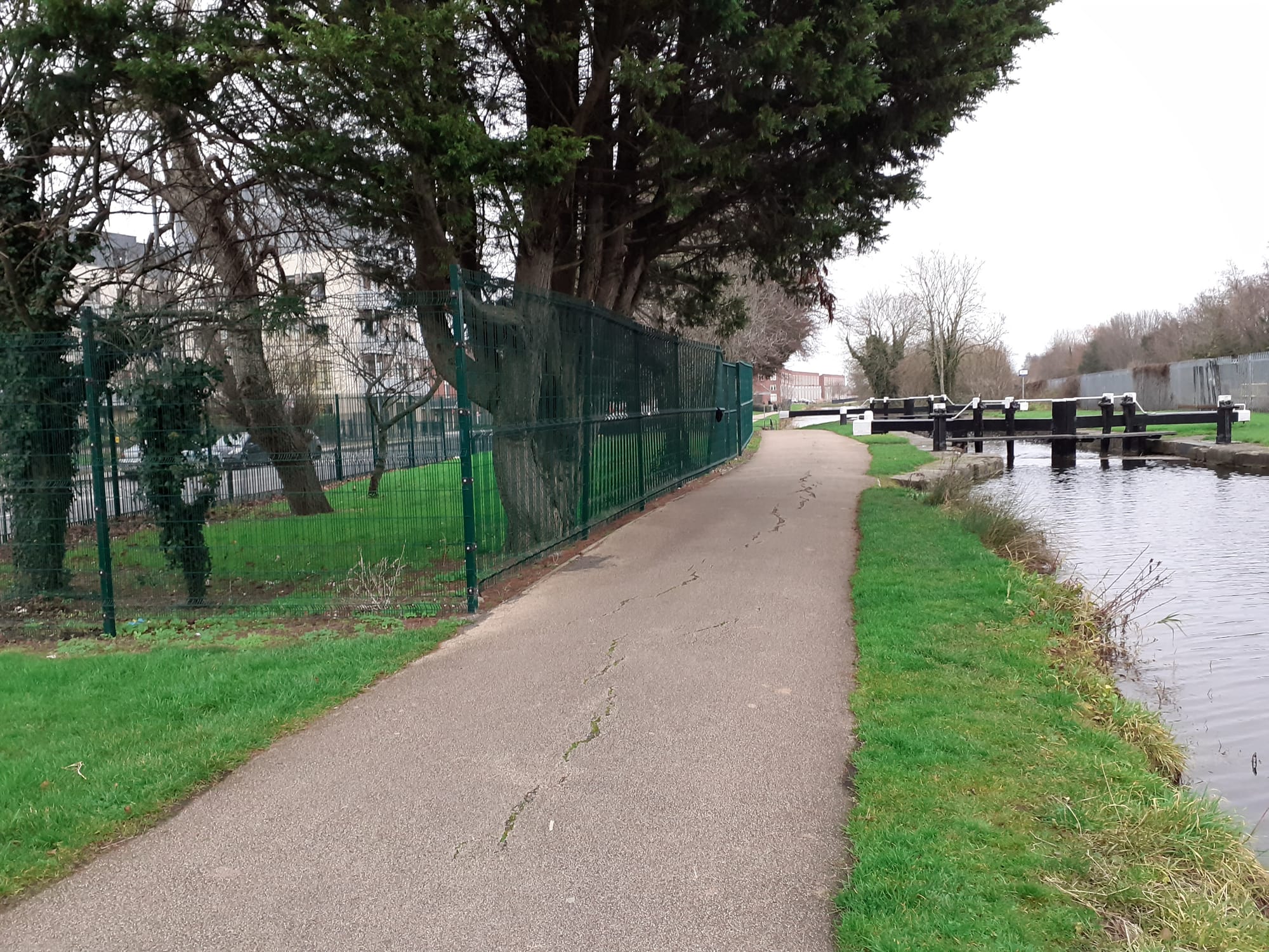 2019 12 Royal Canal Dublin Lock8, fenced in site of former lock keepers house