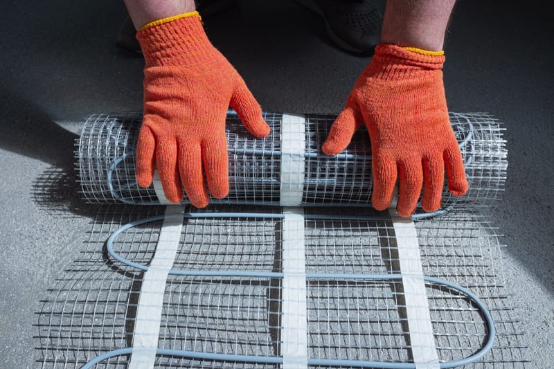 In-Floor Radiant Heating for GTA Bathrooms: Cost, Installation Timing, and the Honest Performance Assessment